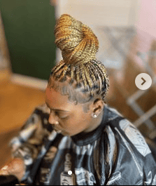 Blonde Knotless Braids With a Bun